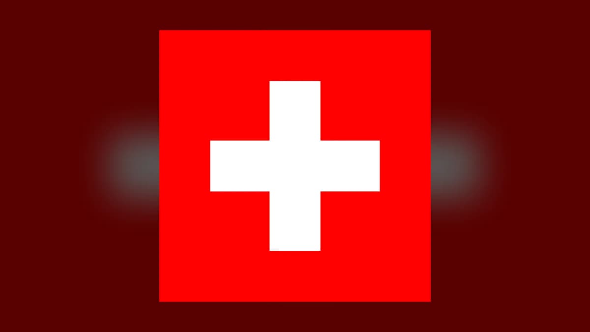 Bandera de Suiza con cruz blanca sobre fondo rojo.